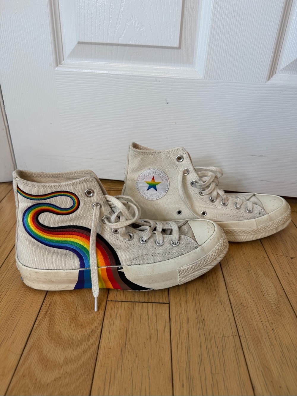 Limited Edition Pride Converse with Rainbow accents men’s 7 women’s 9
